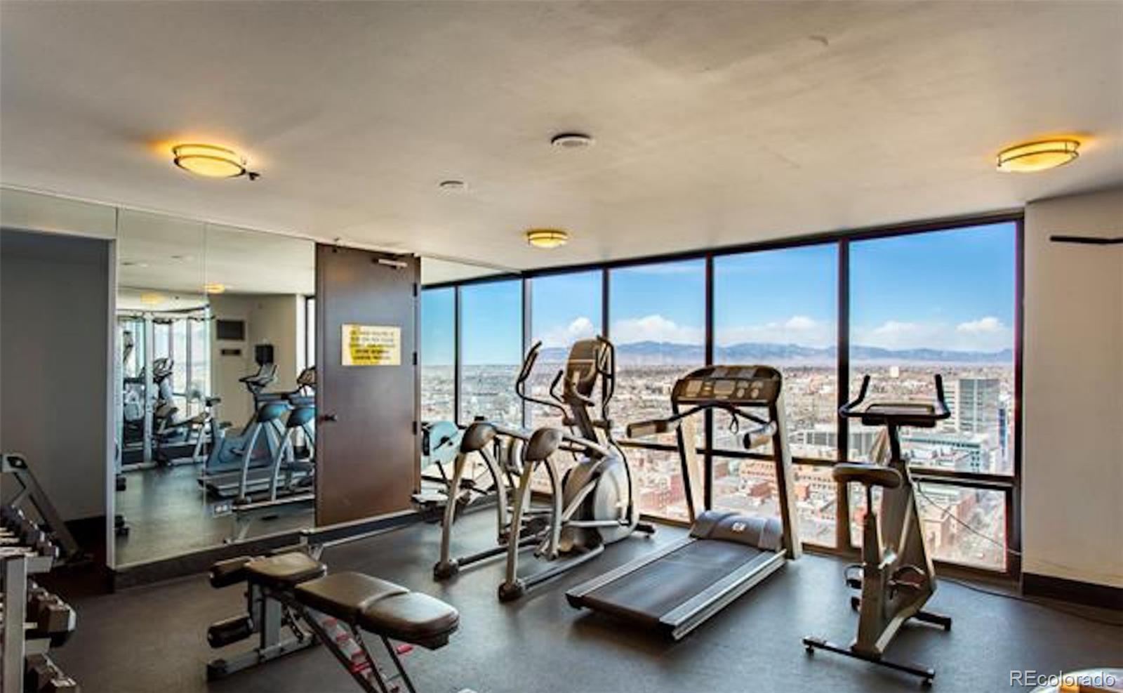 1625 Larimer Street, Unit 3104 Denver, CO 80202 - Photo 25 of 31 a view of a room with gym equipment
