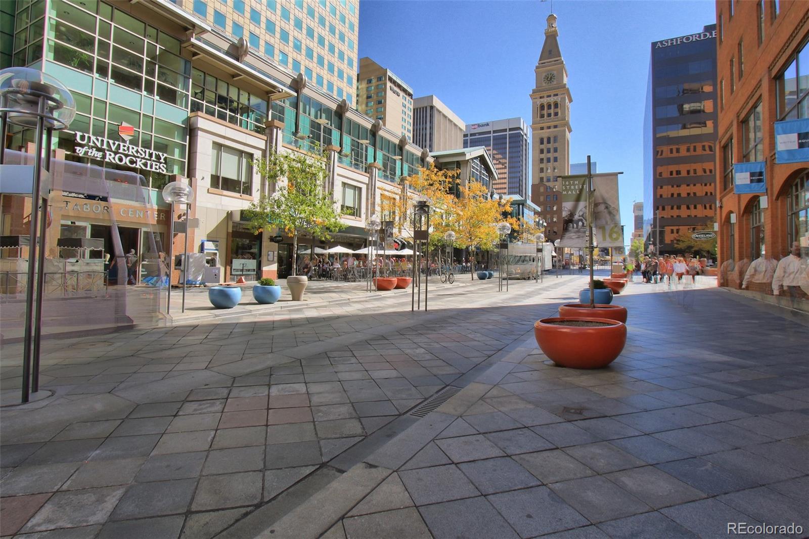 1625 Larimer Street, Unit 3104 Denver, CO 80202 - Photo 31 of 31 a bench is sitting in front of building