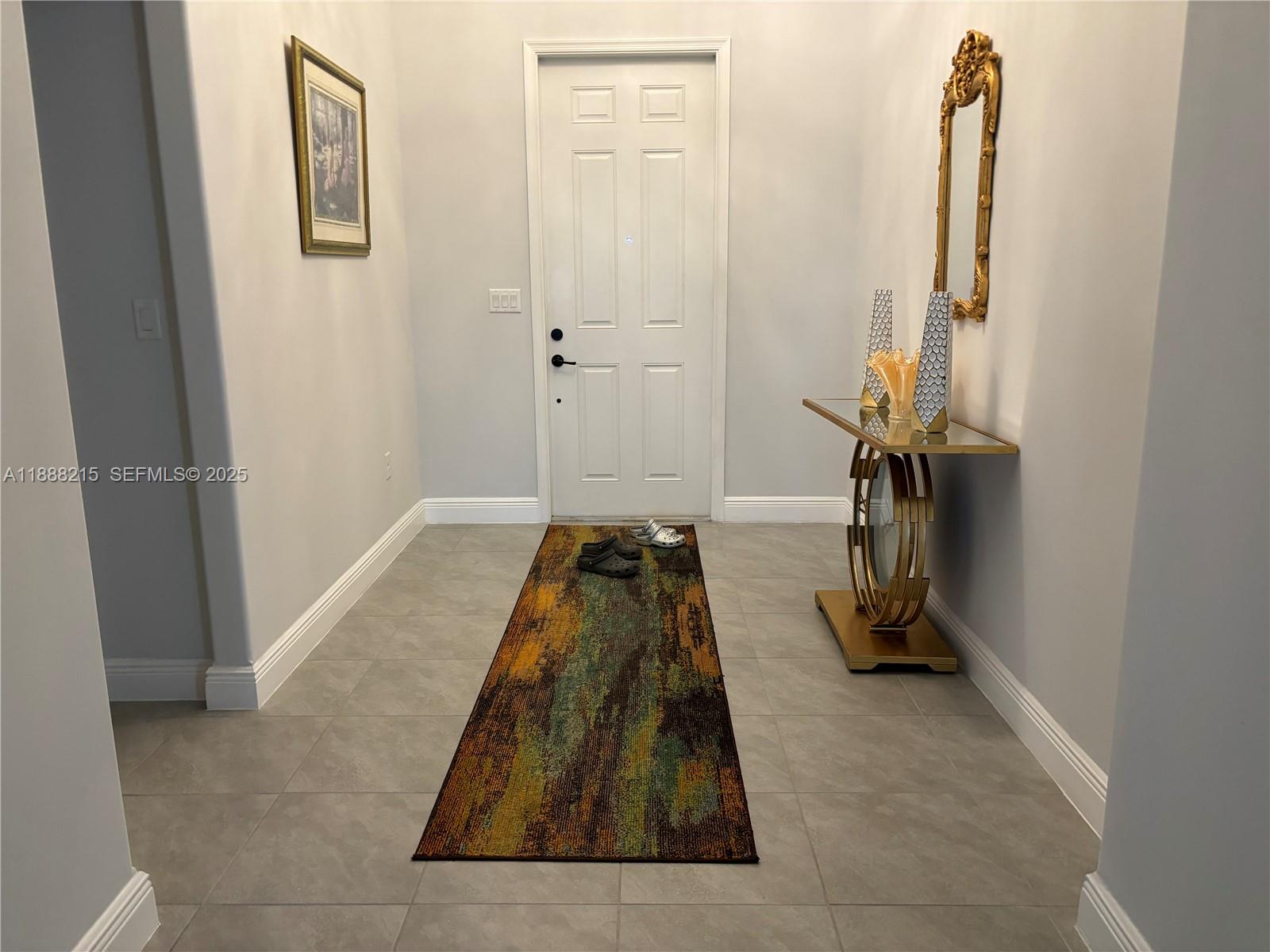 5107 Genoa Street, Unit 5107 Ave Maria, FL 34142 - Photo 13 of 16 a view of a room with gym equipment