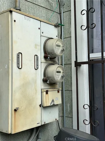 a backyard of a house with outdoor seating