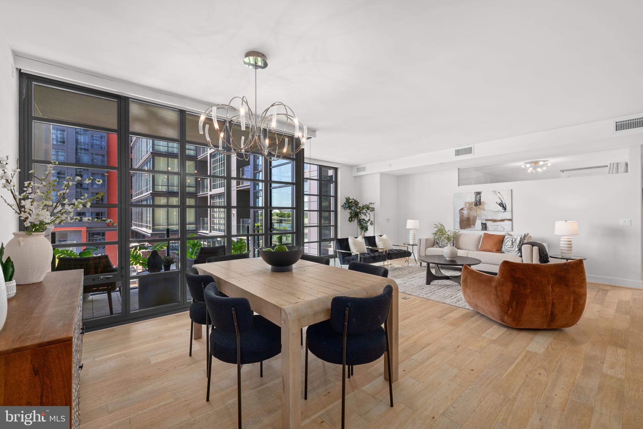 45 Sutton Square Southwest, Unit 406 Washington, DC 20024 - Photo 7 of 29 Black-framed, floor-to-ceiling glass