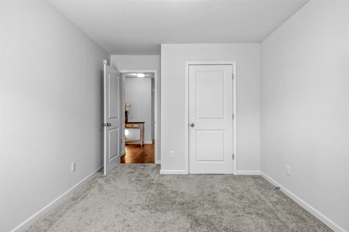 5320 Crossfield Road Memphis, TN 38109 - Photo 12 of 40 an empty room and a bathroom