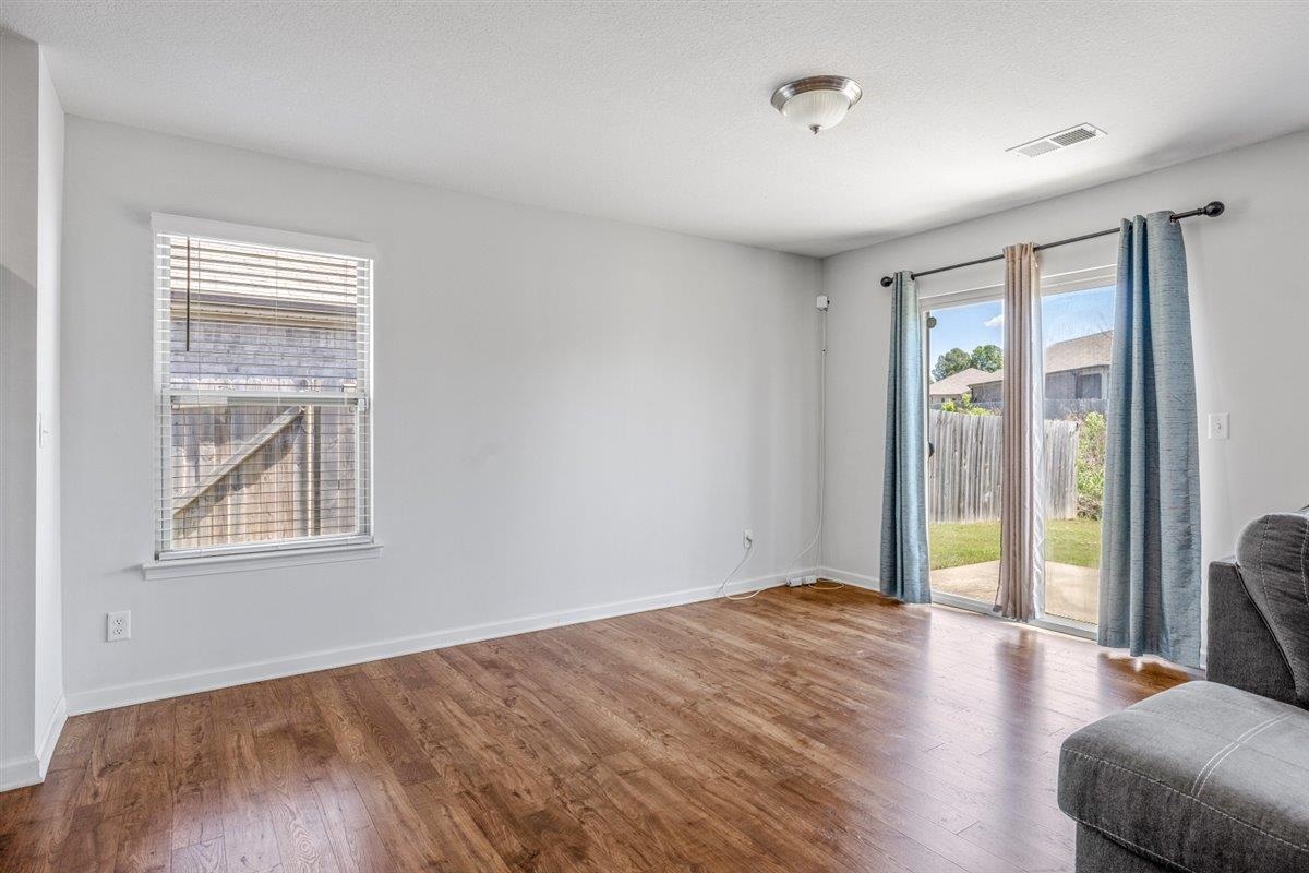 5320 Crossfield Road Memphis, TN 38109 - Photo 18 of 40 a view of an empty room with glass door