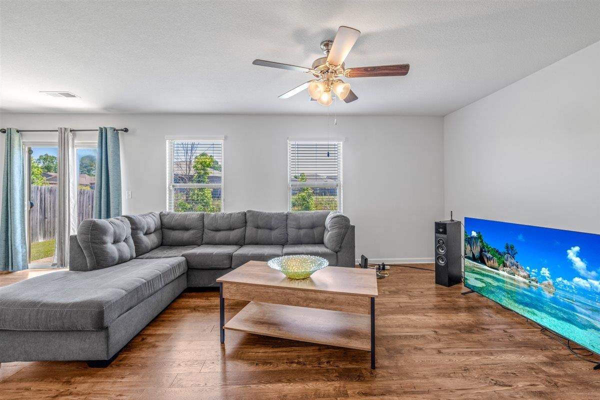 5320 Crossfield Road Memphis, TN 38109 - Photo 20 of 40 a living room with furniture and a fireplace
