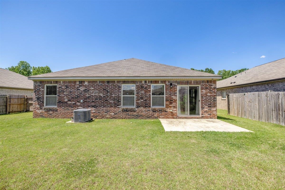 5320 Crossfield Road Memphis, TN 38109 - Photo 2 of 40 a front view of a house with yard porch and furniture