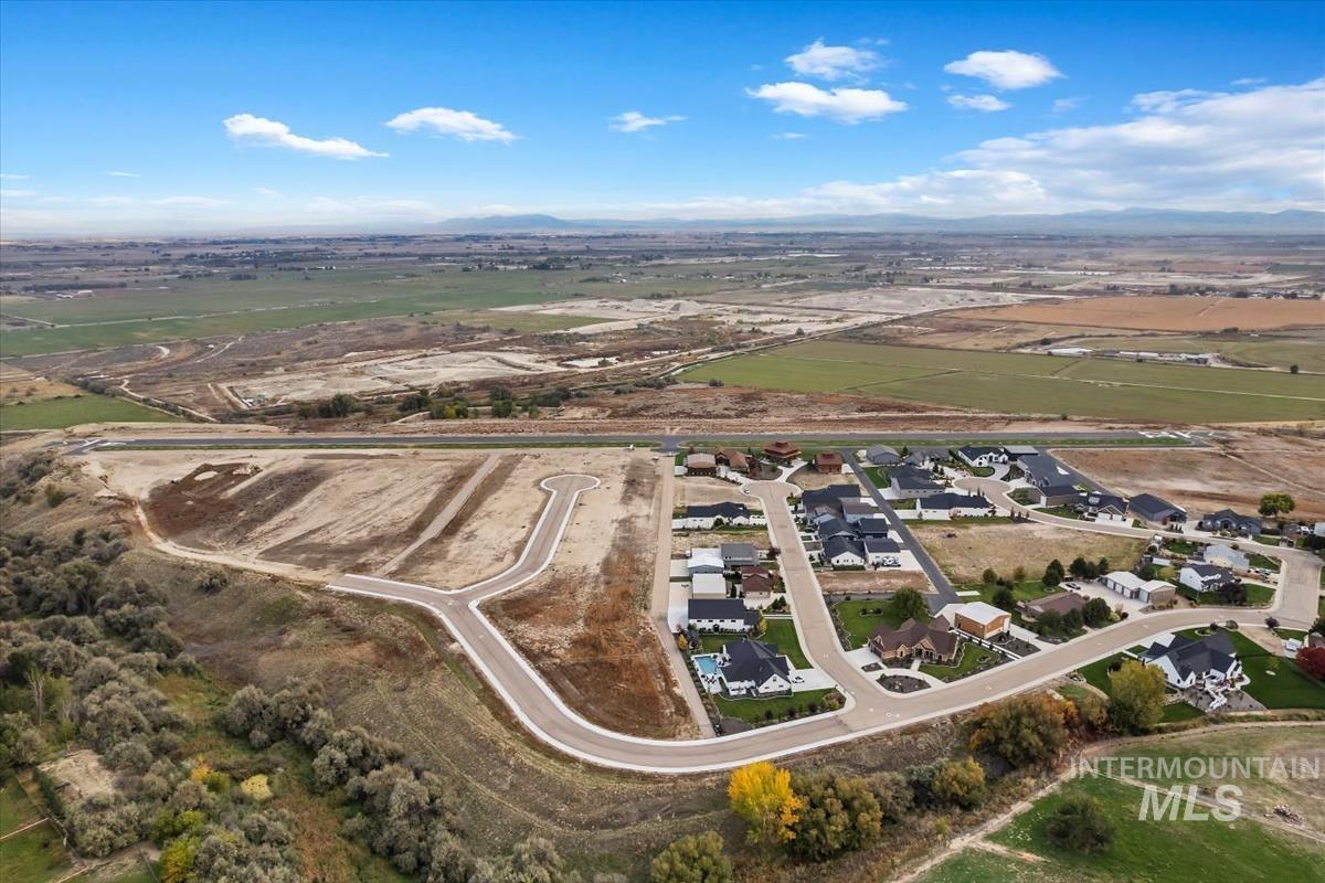 Beechcraft Circle Greenleaf, ID 83626 - Photo 4 of 10 Aerial view of property's location with nearby suburban area and mountains