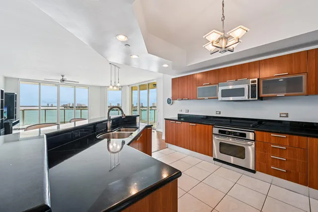$899,000 | 2650 Lake Shore Drive, Unit 1006, Riviera Beach, FL 33404