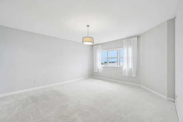 $899,000 | 2650 Lake Shore Drive, Unit 1006, Riviera Beach, FL 33404