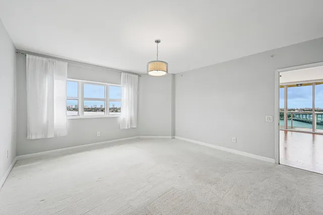 $899,000 | 2650 Lake Shore Drive, Unit 1006, Riviera Beach, FL 33404