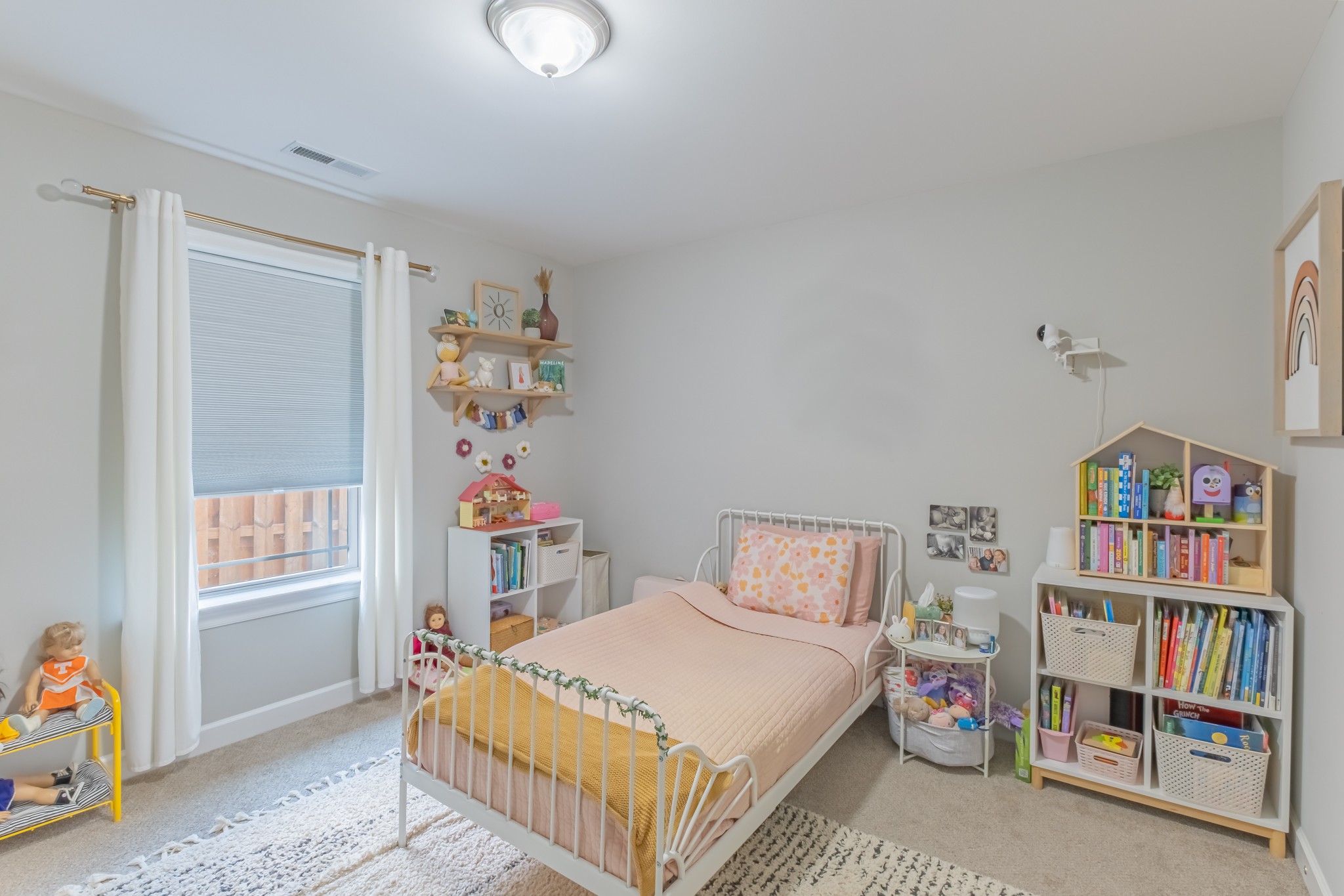 296 Spring Breeze Drive Tullahoma, TN 37388 - Photo 23 of 31 a bedroom with a bed and a window