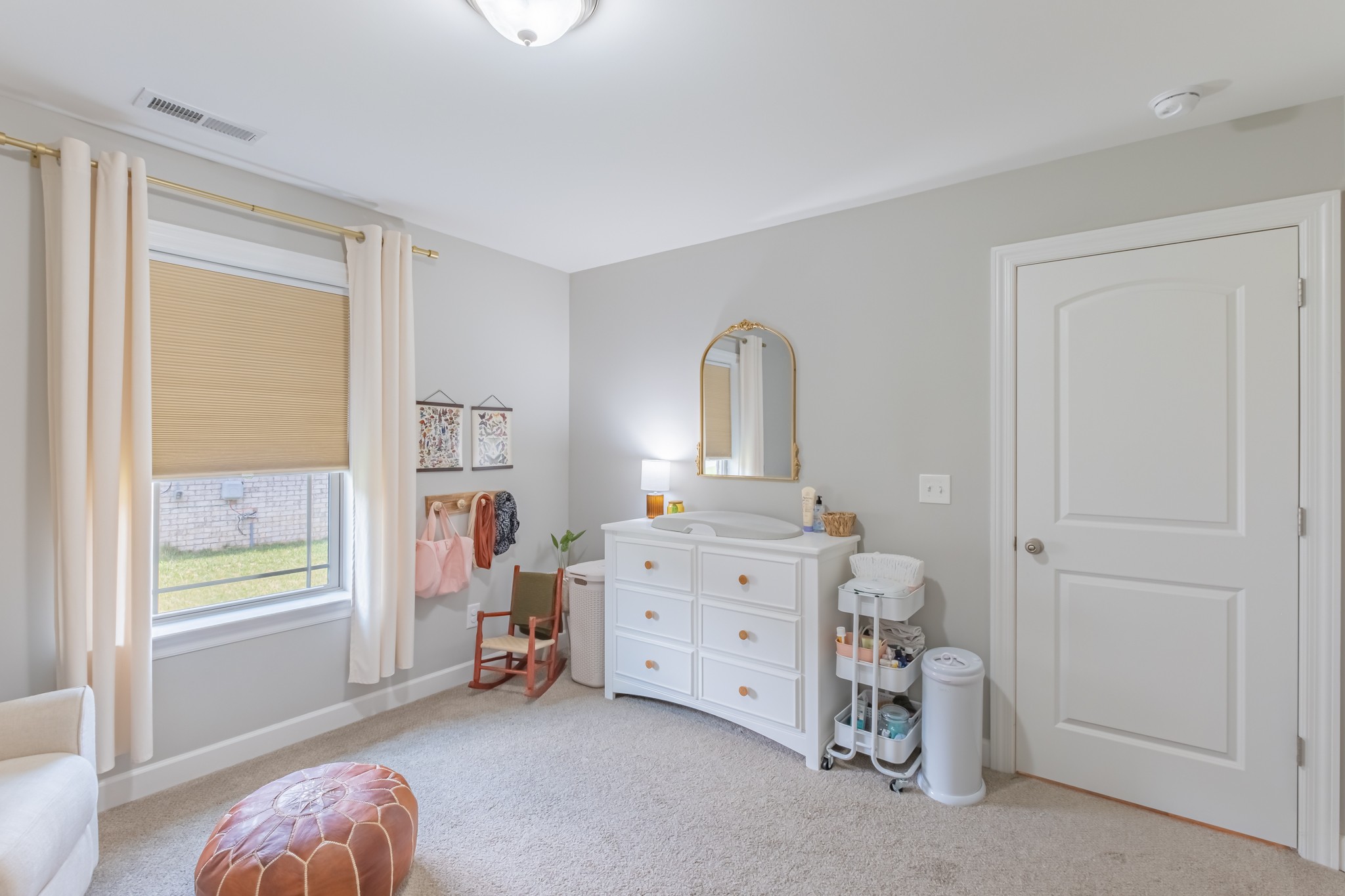 296 Spring Breeze Drive Tullahoma, TN 37388 - Photo 27 of 31 a room with a baby bed baby crib and a window