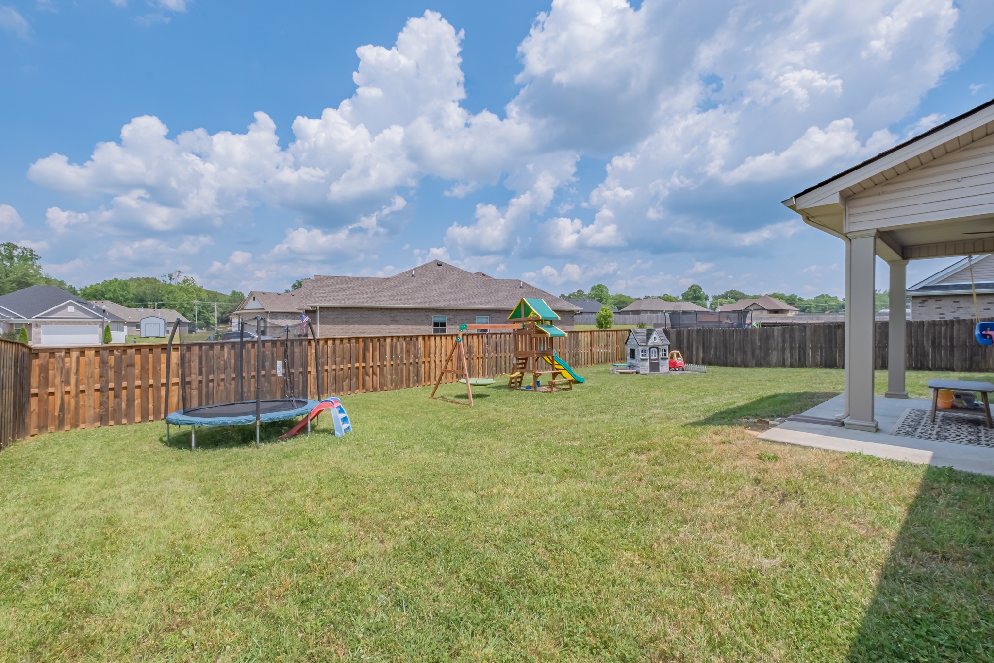 296 Spring Breeze Drive Tullahoma, TN 37388 - Photo 29 of 31 a view of a house with a yard and sitting area