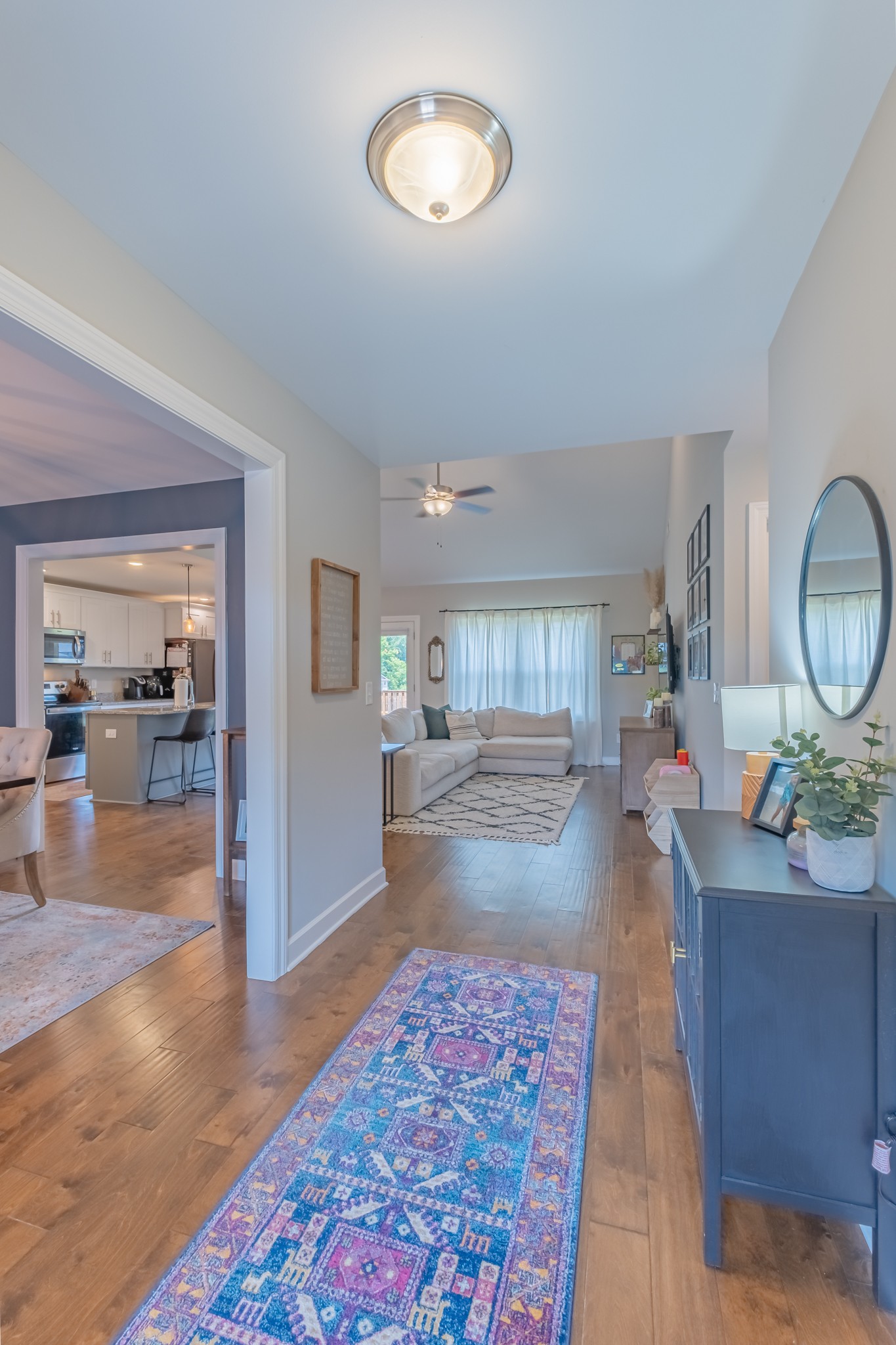 296 Spring Breeze Drive Tullahoma, TN 37388 - Photo 3 of 31 a living room with furniture and a dining table