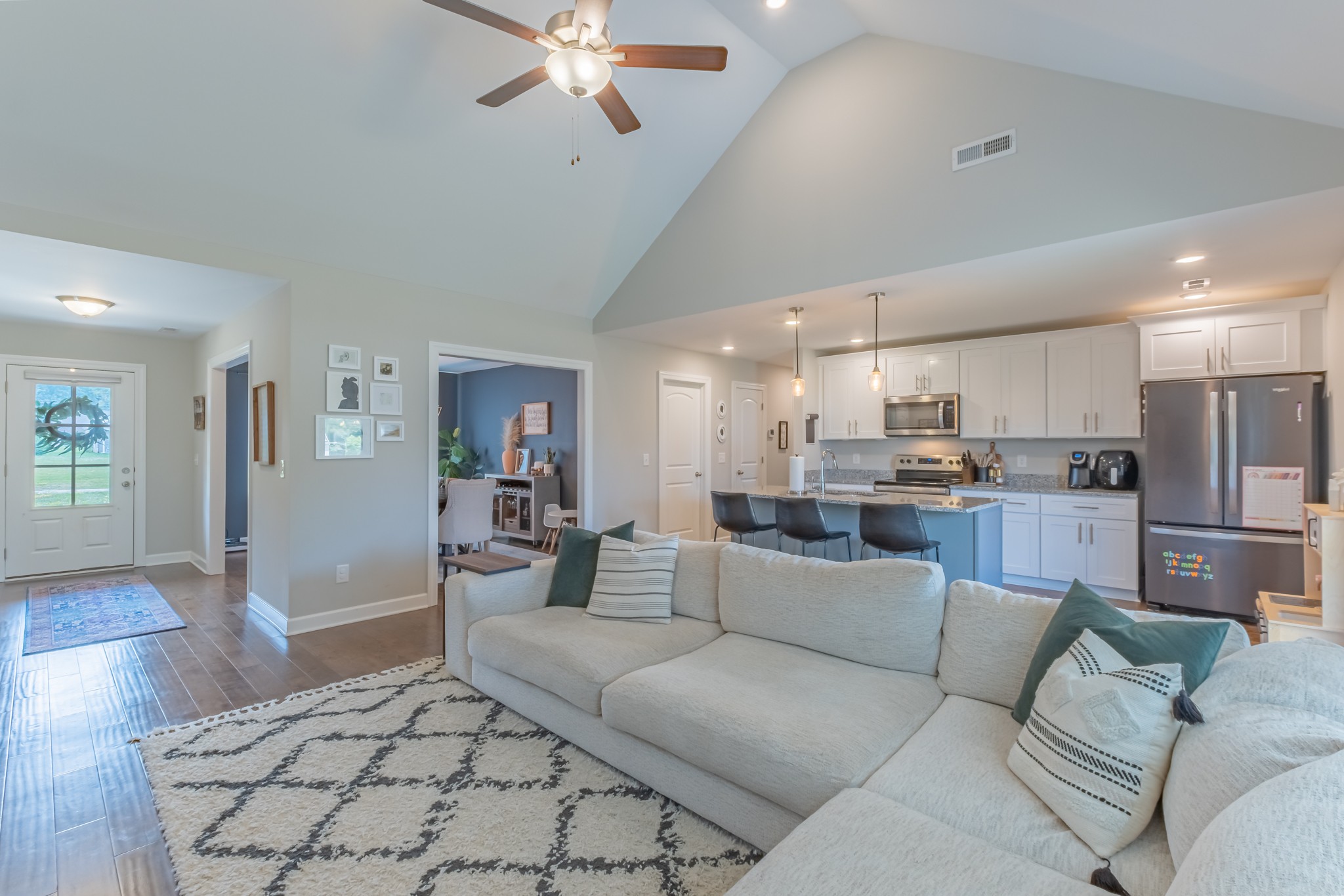 296 Spring Breeze Drive Tullahoma, TN 37388 - Photo 9 of 31 a living room with furniture and a view of kitchen