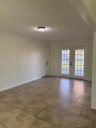 en view of an empty room with a window