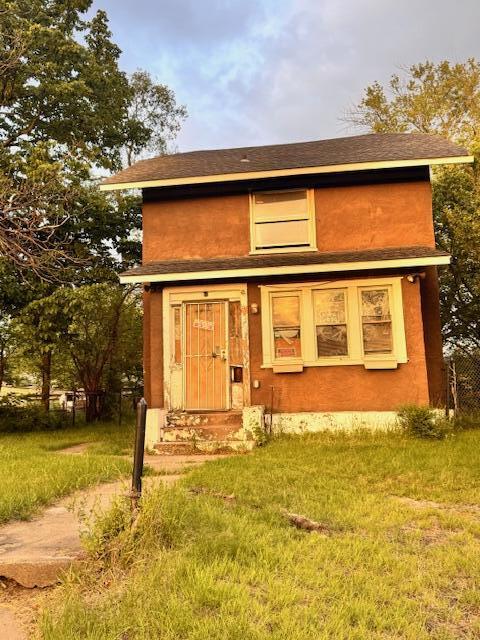 a front view of house with outdoor space and swimming pool