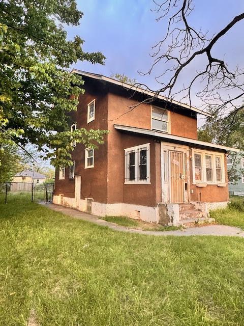 435 Buchanan Street Gary, IN 46402 - Photo 2 of 4 a front view of house with yard