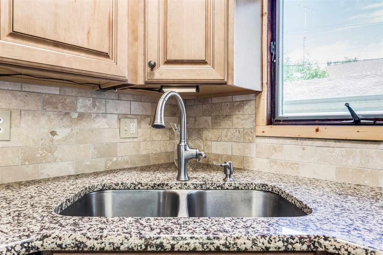 7491 Cedar Road Lexington, MI 48450 - Photo 18 of 39 Granite Counters