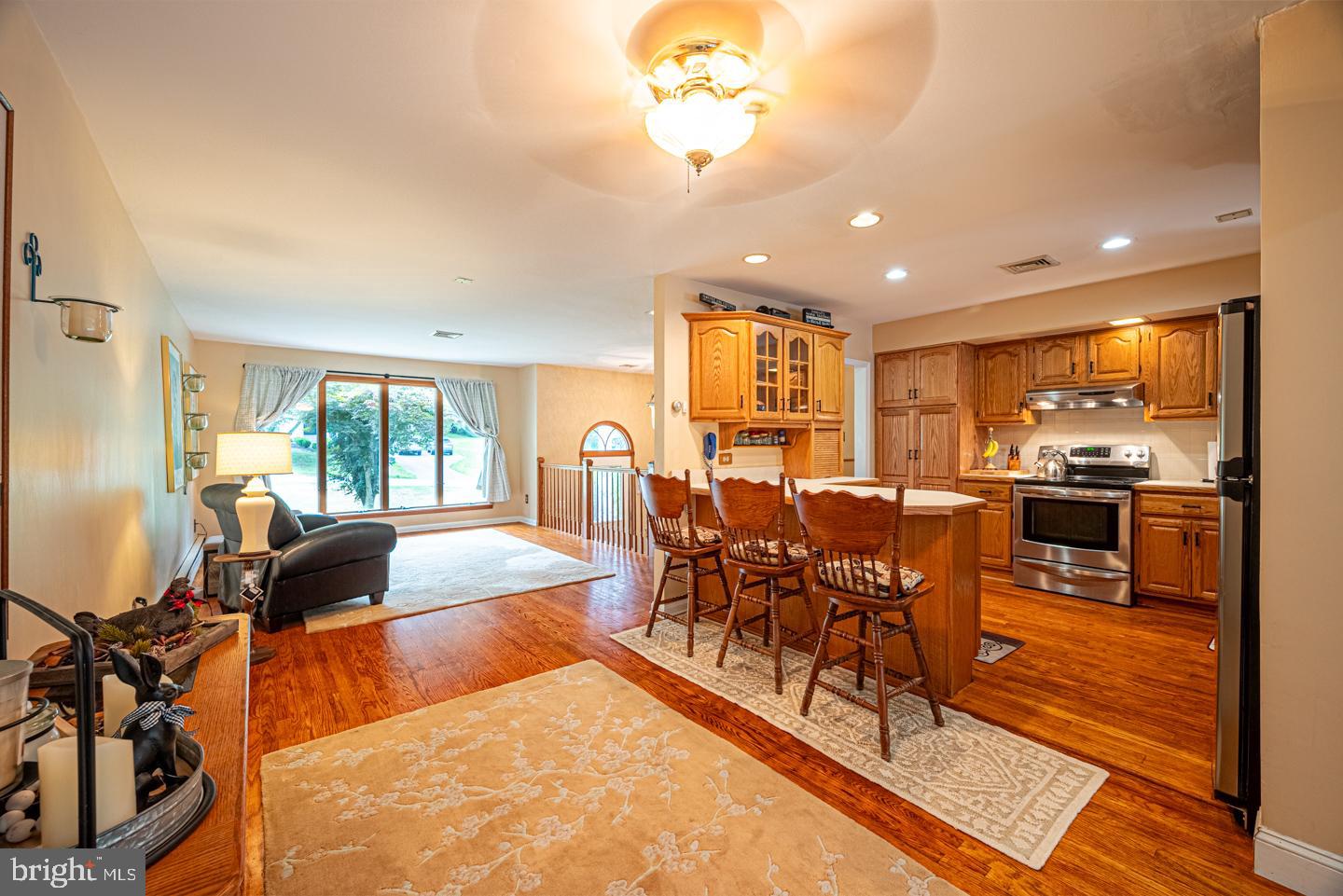 8 Devon Lane Media, PA 19063 - Photo 17 of 75 a living room with furniture a large window and a dining table