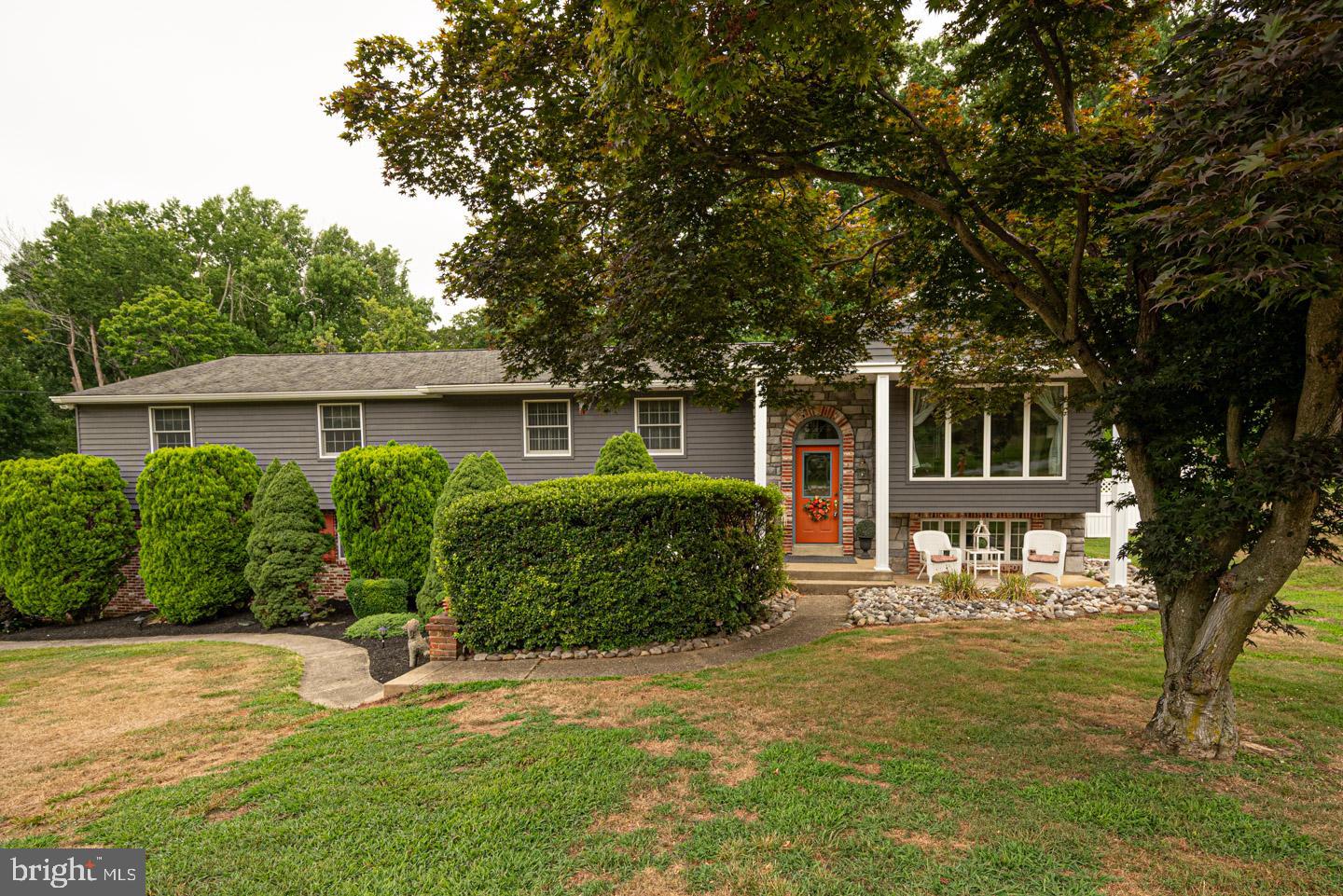 8 Devon Lane Media, PA 19063 - Photo 3 of 75 a front view of a house with garden