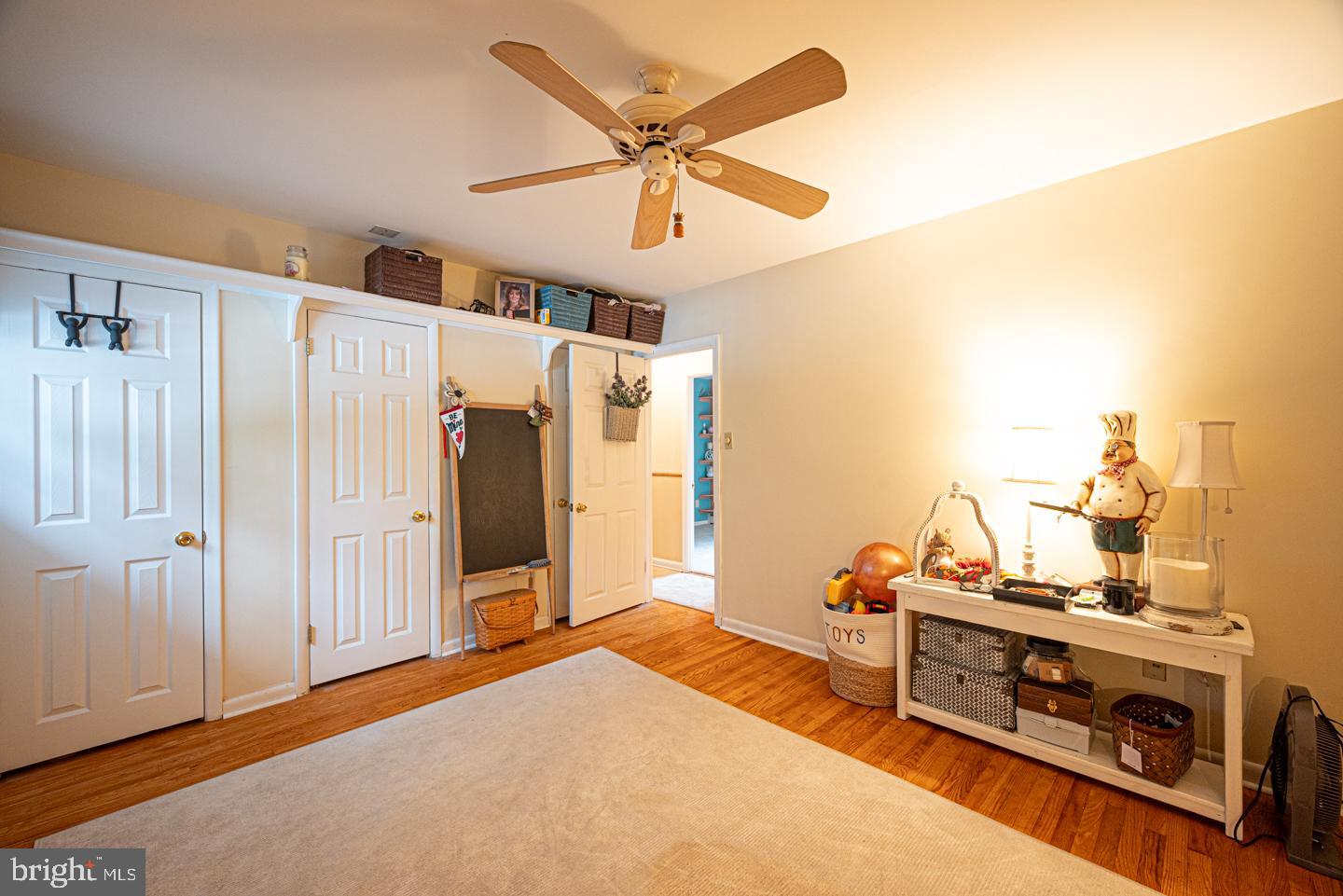 8 Devon Lane Media, PA 19063 - Photo 36 of 75 a bedroom with a bed and a ceiling fan