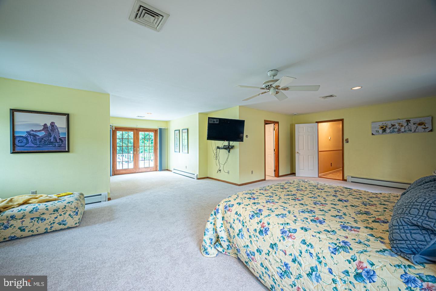 8 Devon Lane Media, PA 19063 - Photo 40 of 75 a bedroom with a bed and a couch