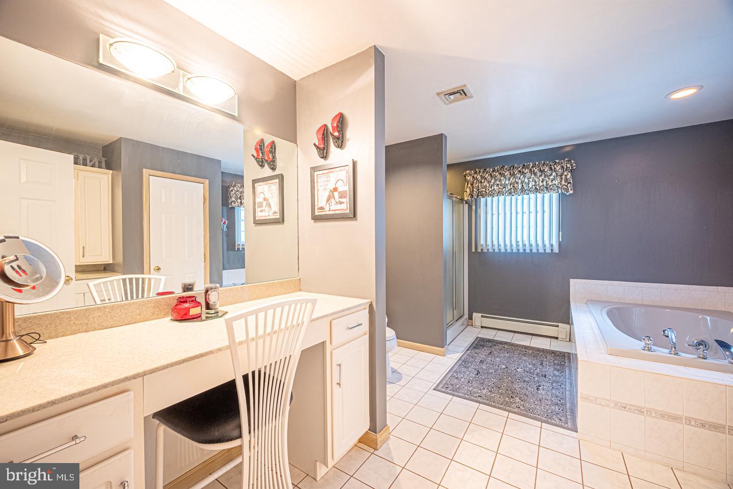 8 Devon Lane Media, PA 19063 - Photo 43 of 75 a bathroom with a sink vanity and mirror