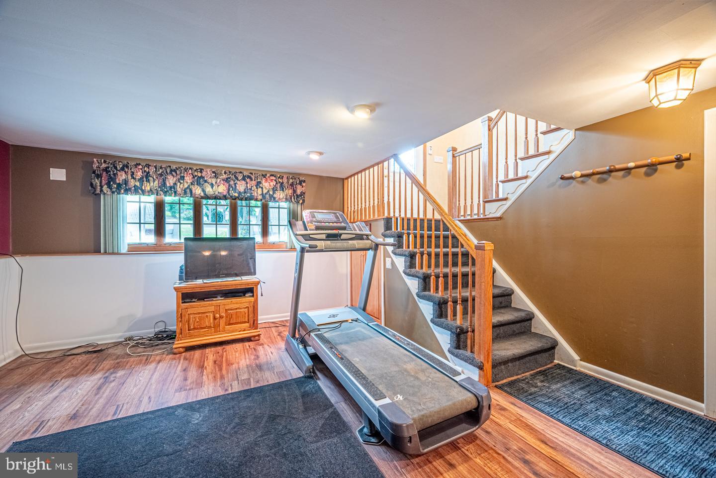 8 Devon Lane Media, PA 19063 - Photo 46 of 75 a view of staircase with furniture and a floor to ceiling window