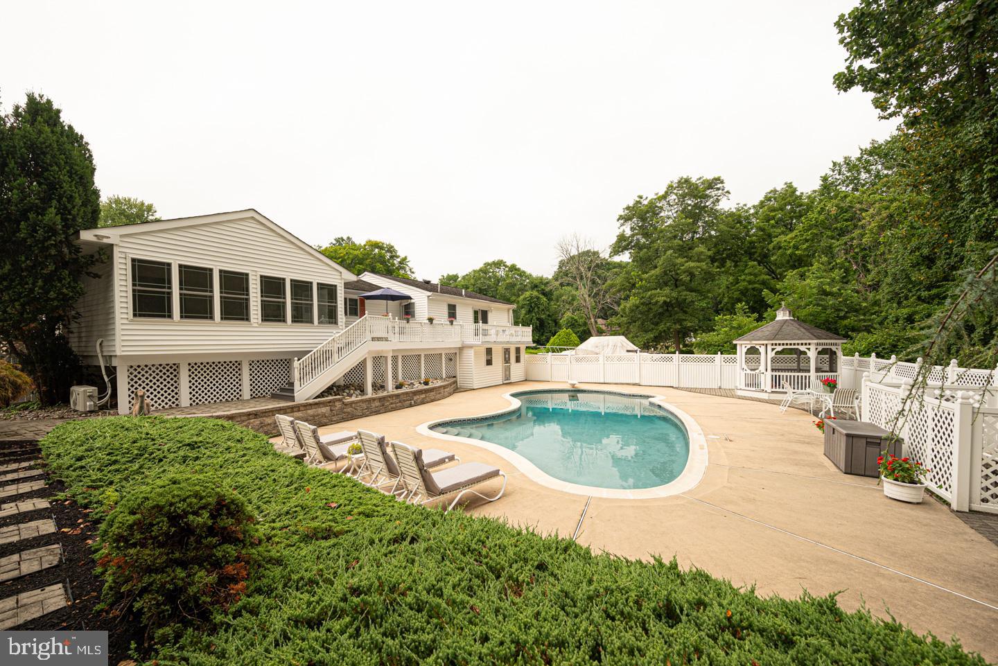 8 Devon Lane Media, PA 19063 - Photo 58 of 75 an aerial view of a house with swimming pool