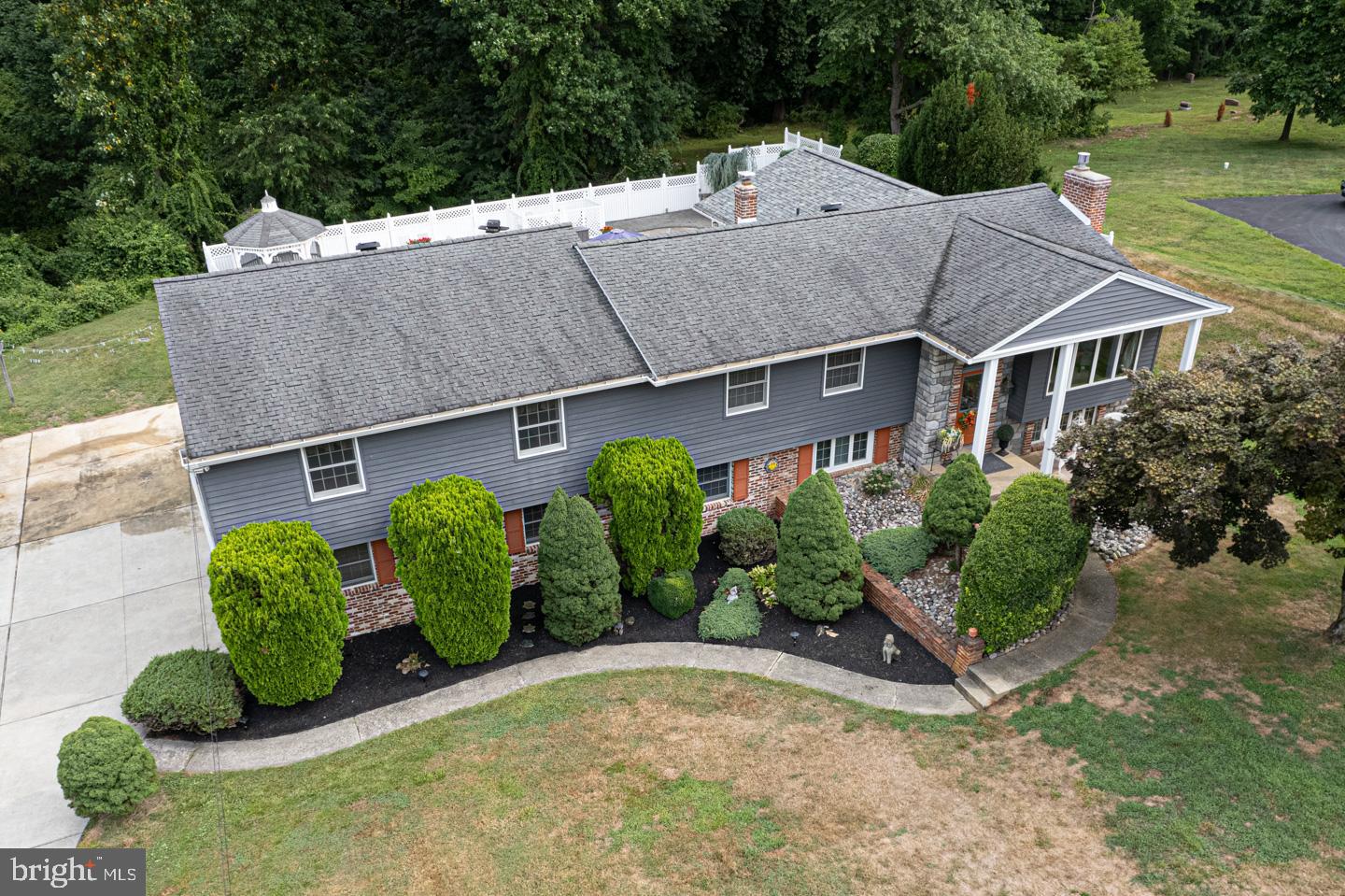 8 Devon Lane Media, PA 19063 - Photo 69 of 75 an aerial view of a house with a yard and potted plants