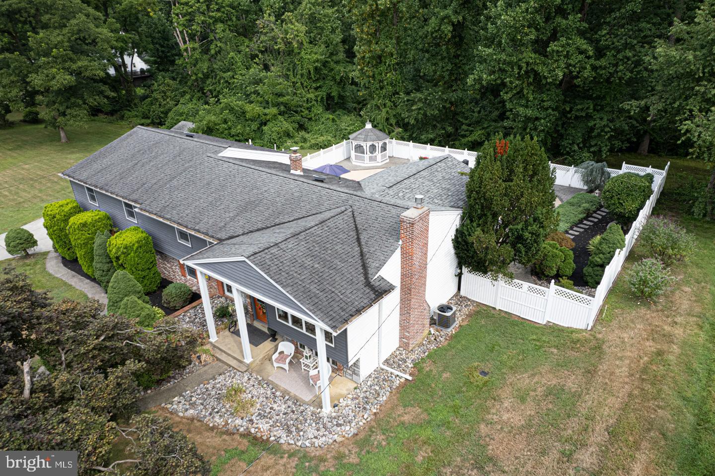 8 Devon Lane Media, PA 19063 - Photo 70 of 75 an aerial view of a house with a yard table and chairs
