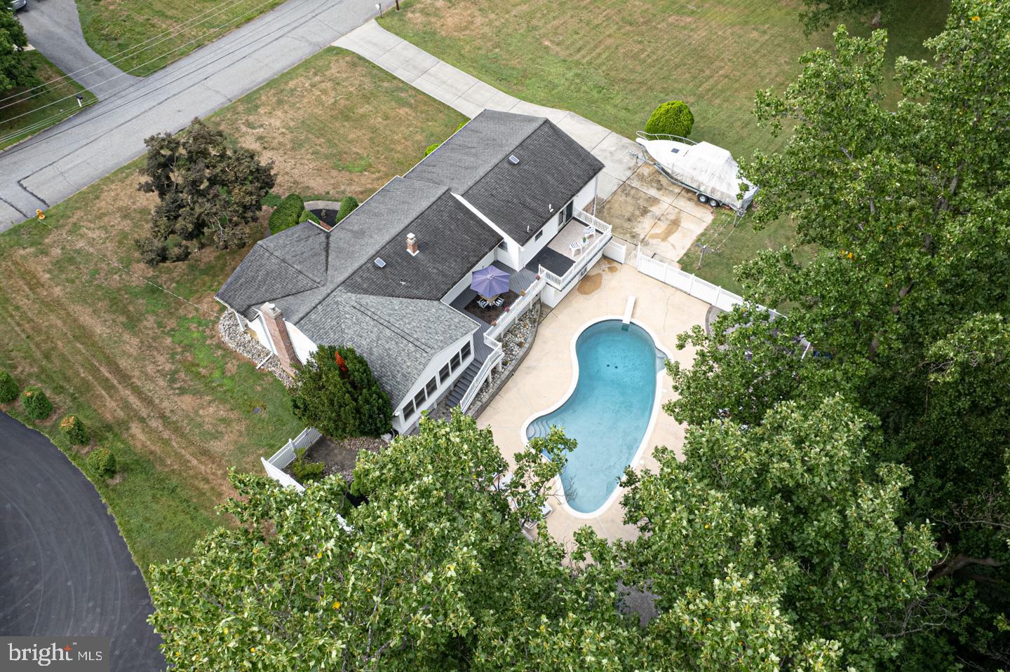 8 Devon Lane Media, PA 19063 - Photo 71 of 75 an aerial view of a house with a yard and large trees