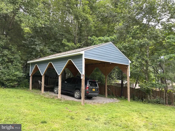 a view of a backyard with a house