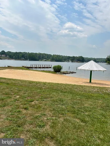 a swimming pool with wooden fence