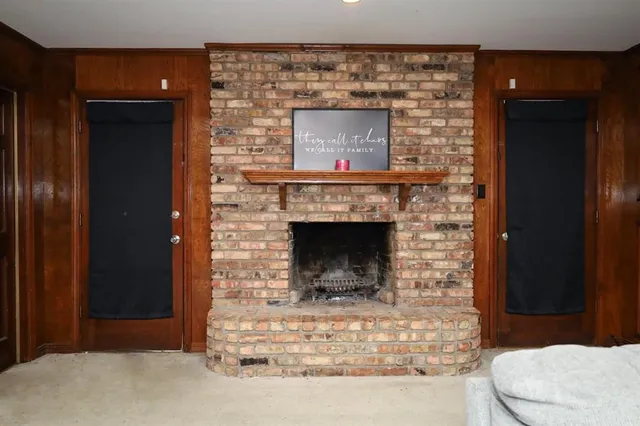a living room with a fireplace