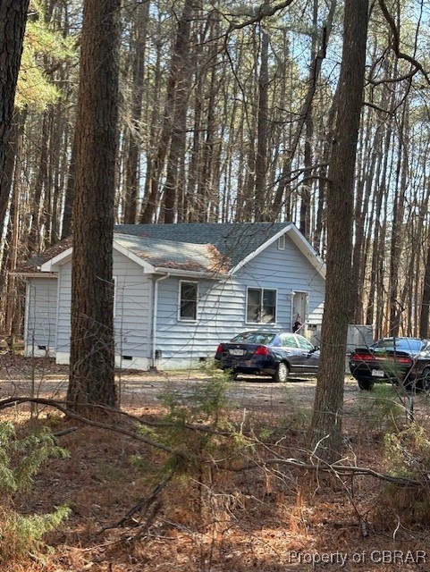 171 Lillys Neck Road Moon, VA 23119 - Photo 15 of 38 View of front of house with a shingled roof and crawl space