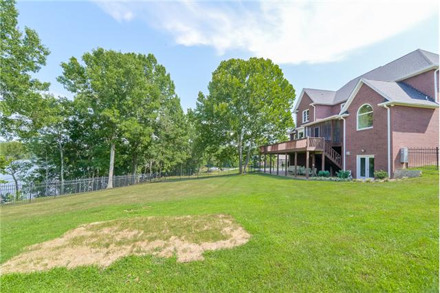 2427 Mann Road Lebanon, TN 37087 - Photo 17 of 18 a view of a big room with a big yard and large trees