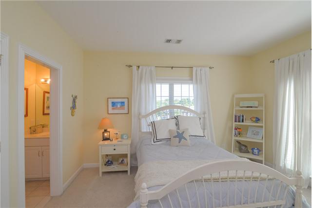 2427 Mann Road Lebanon, TN 37087 - Photo 10 of 18 a bedroom with a bed and a table chair