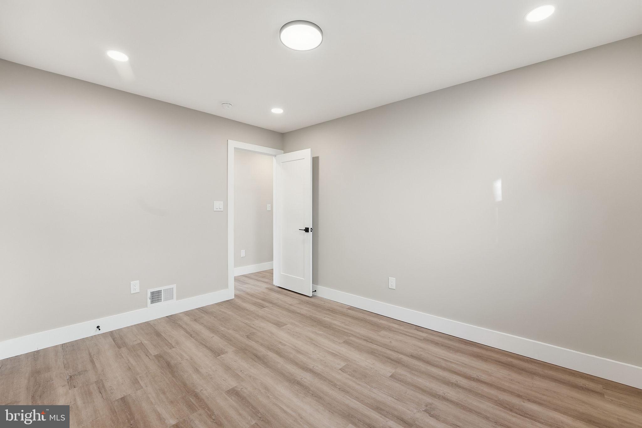 5716 Somerset Road Riverdale, MD 20737 - Photo 16 of 24 a view of an empty room