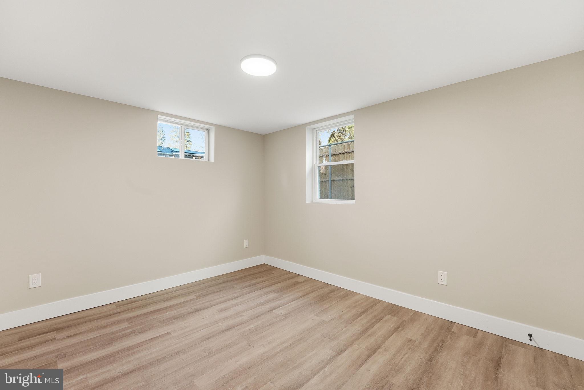 5716 Somerset Road Riverdale, MD 20737 - Photo 20 of 24 an empty room with a workspace