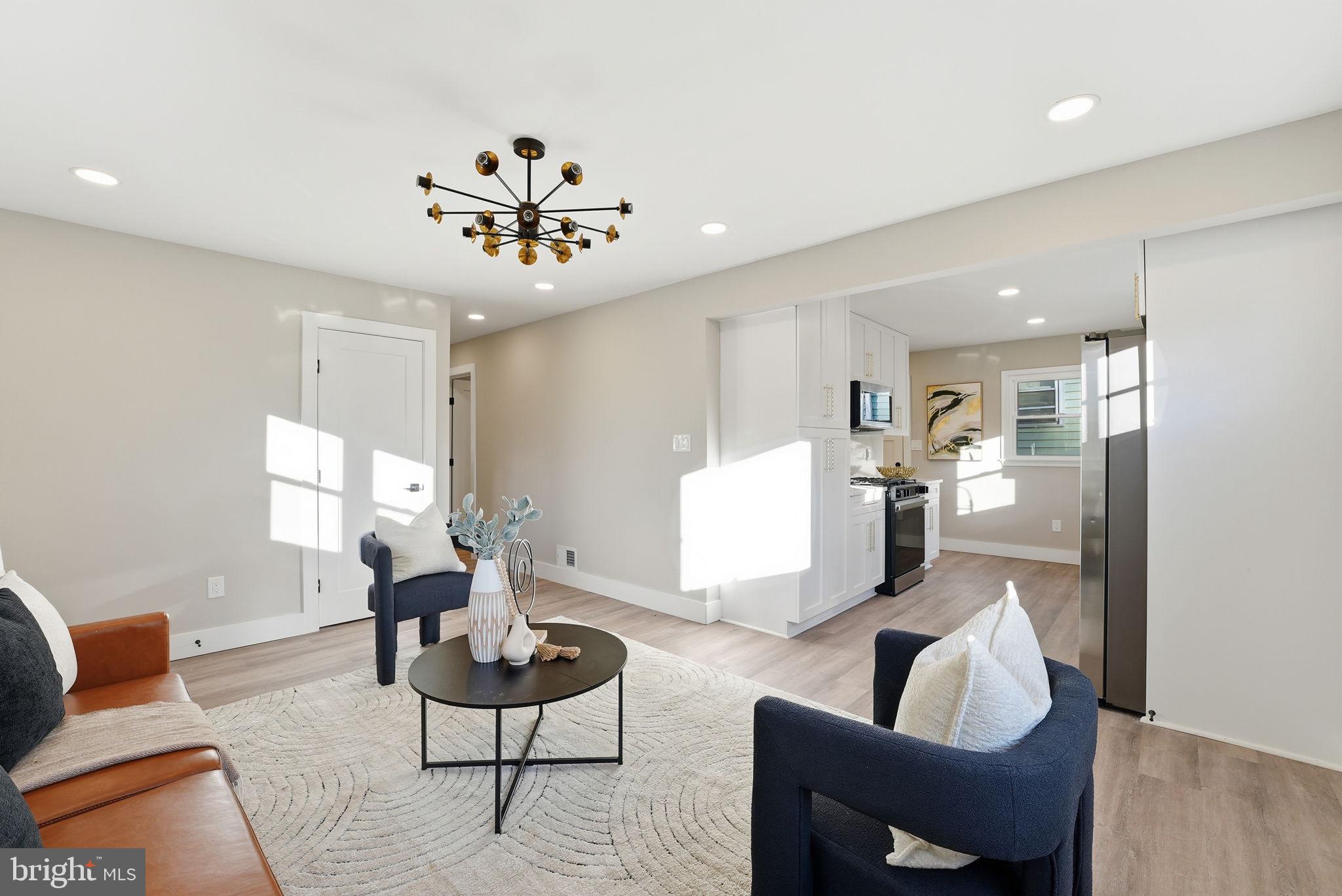 5716 Somerset Road Riverdale, MD 20737 - Photo 6 of 24 a living room with furniture