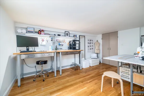 a view of a workspace with furniture