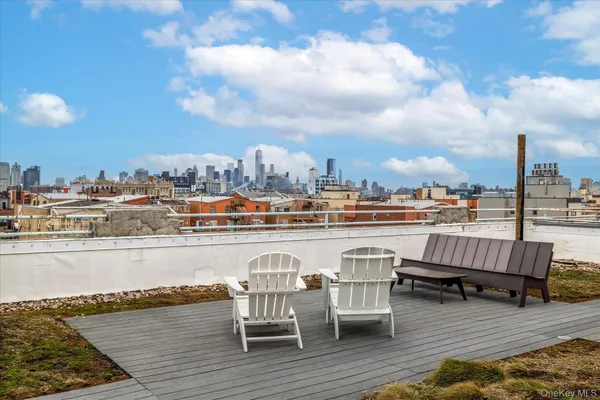 a view of a terrace with seating space