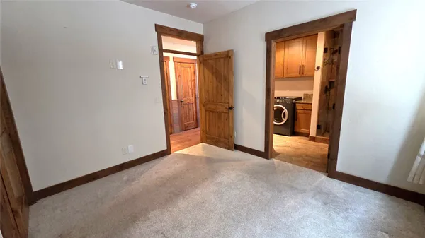 an empty room and closet area