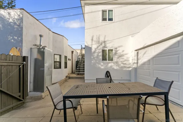 a view of balcony with furniture