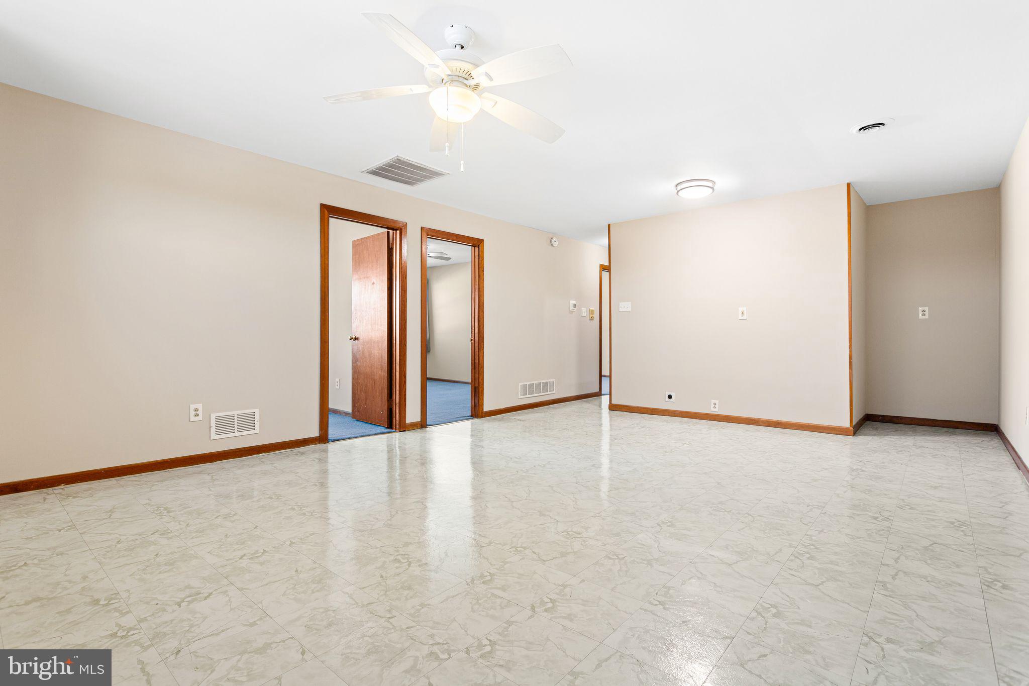 2623 Knights Road Bensalem, PA 19020 - Photo 32 of 50 an empty room with fan and windows
