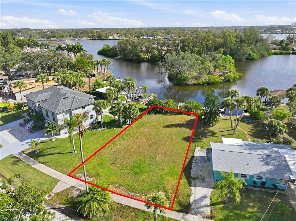 56 Inness Drive Tarpon Springs, FL 34689 - Photo 2 of 10 an aerial view of a house
