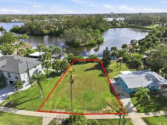 an aerial view of lake residential house with outdoor space