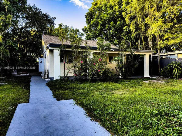 front view of house with a yard