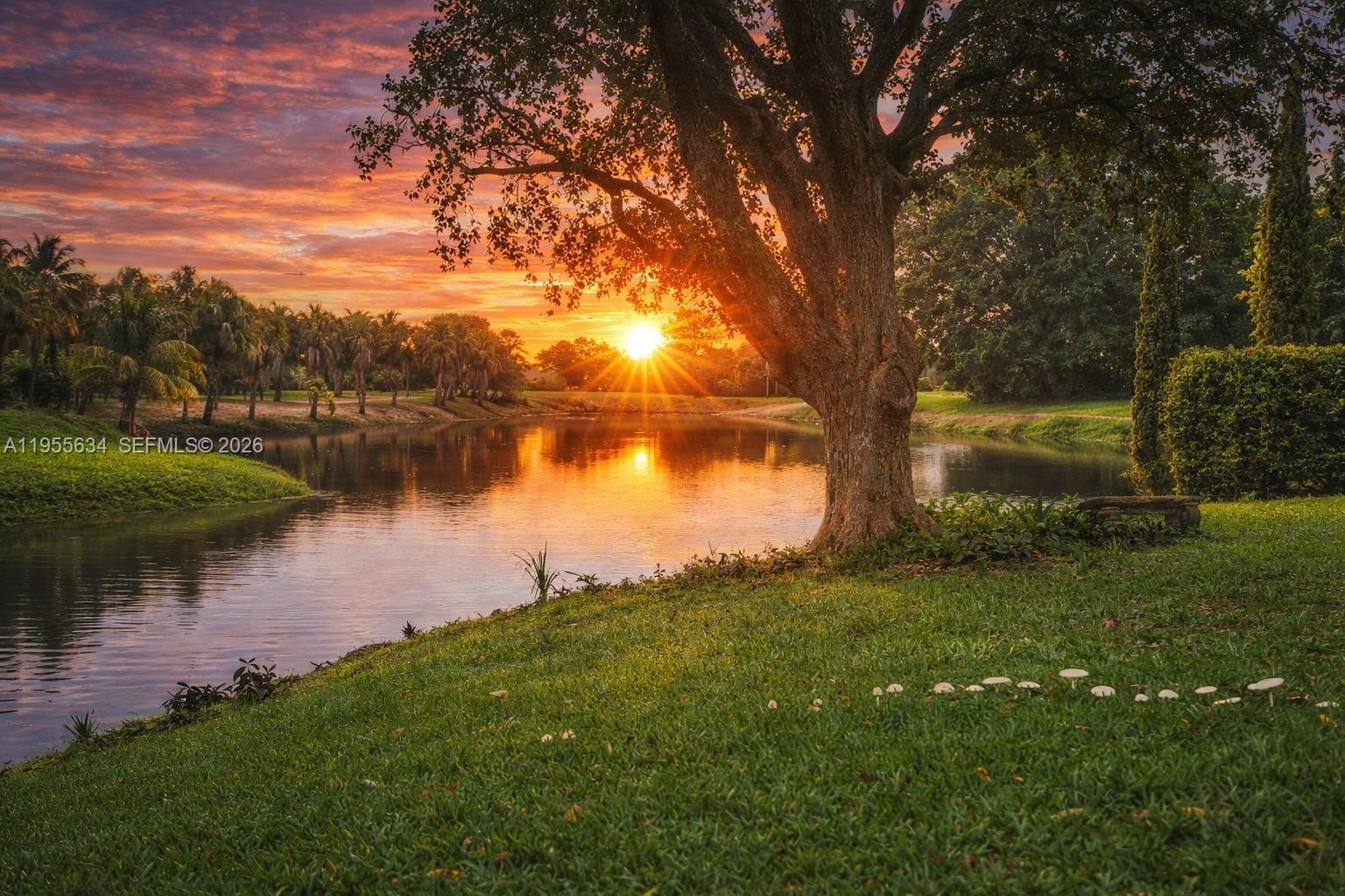 5700 White Hickory Circle Tamarac, FL 33319 - Photo 1 of 18 a view of a lake from a yard